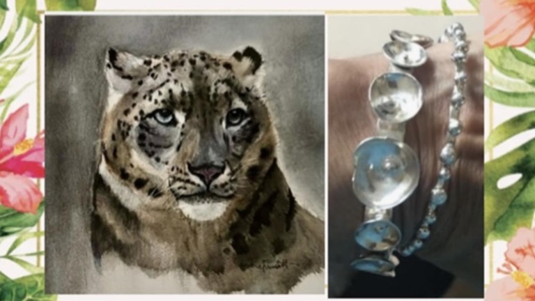 Målning av lejon bredvid smycke